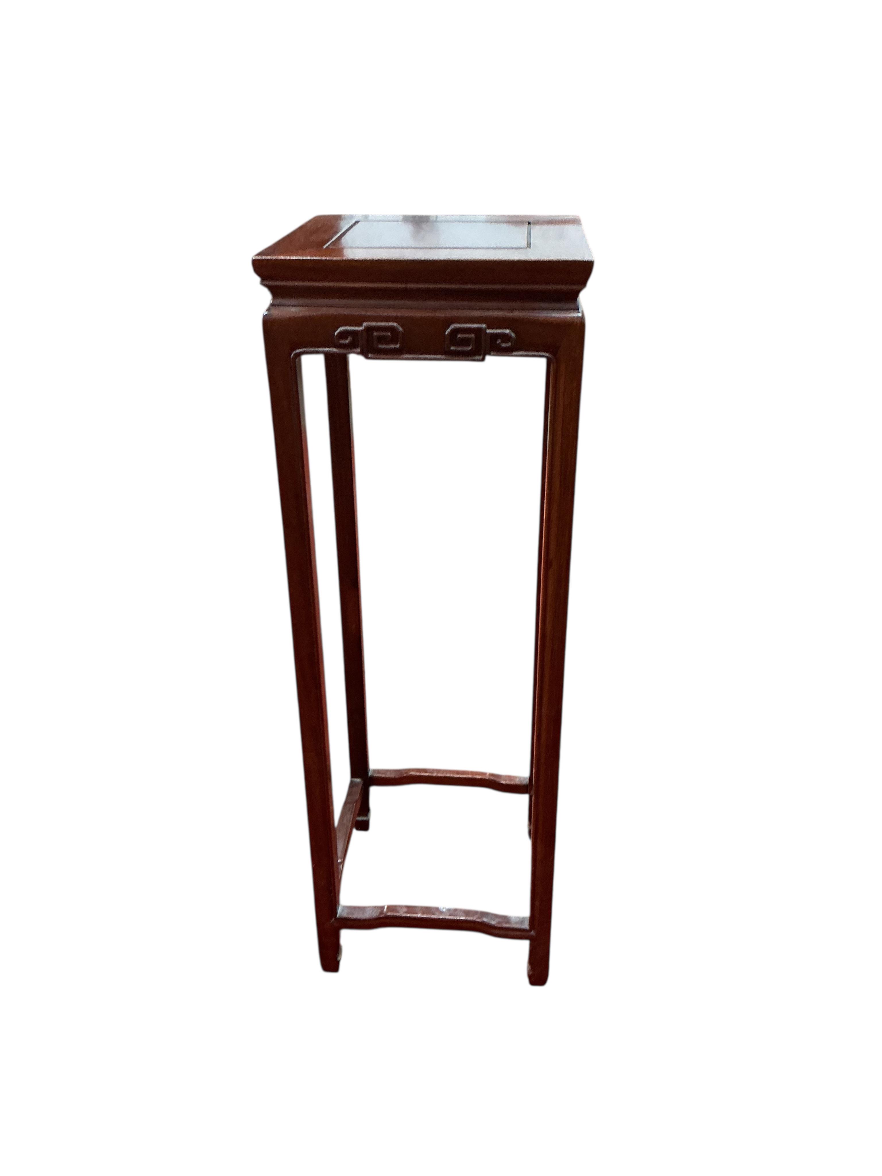 A Chinese hardwood vase stand, width 30cm, height 91cm